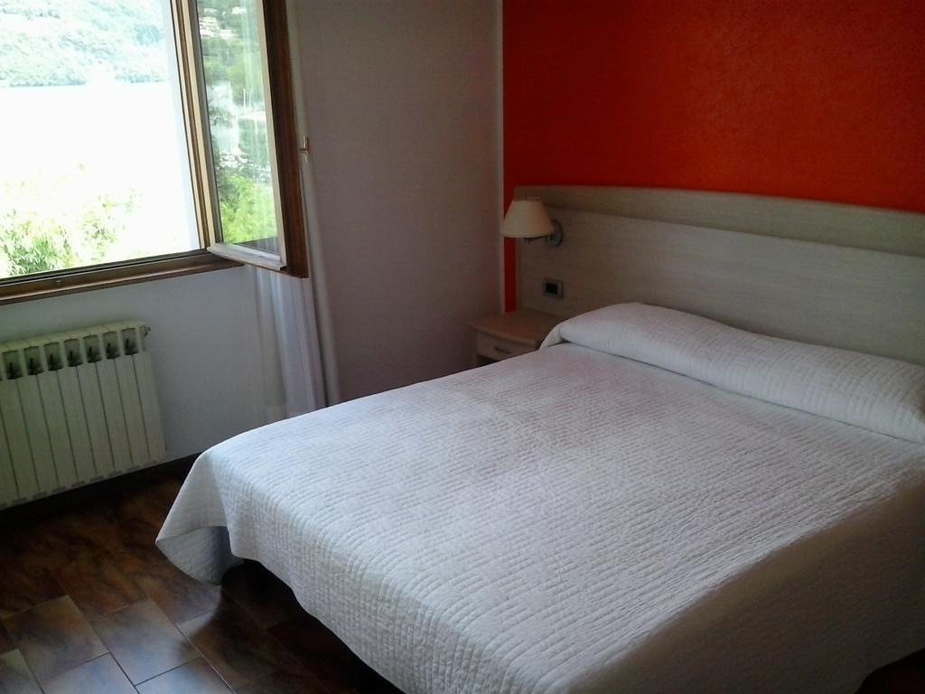 Hotel Pizzeria Mezzolago แปร์จีนา วัลซูกานา ภายนอก รูปภาพ